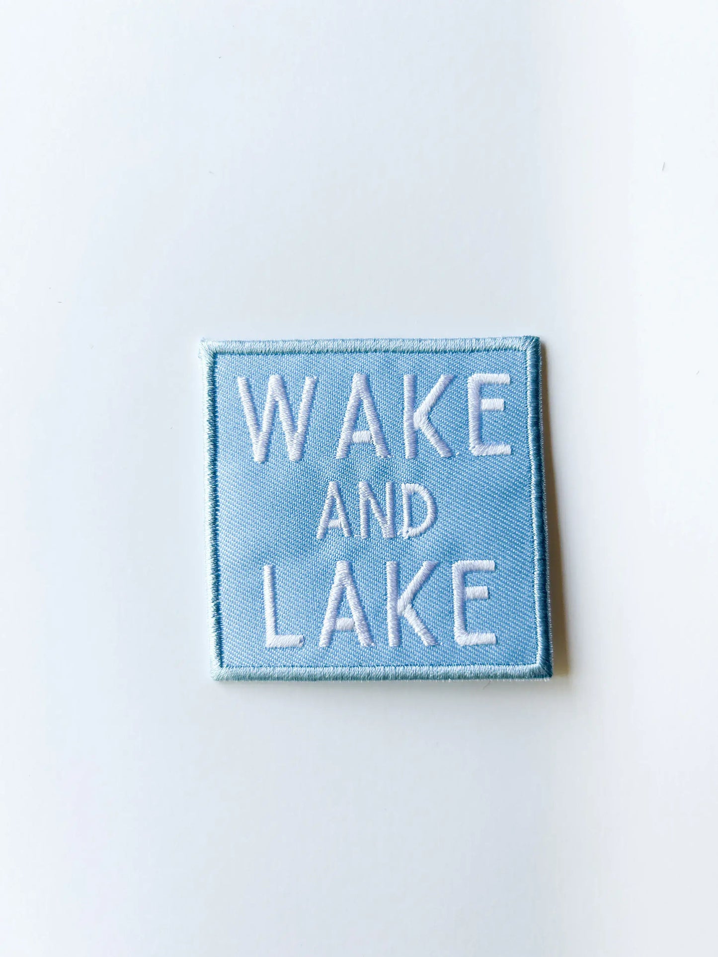 Wake and Lake Light Blue Embroidered Iron On Patch